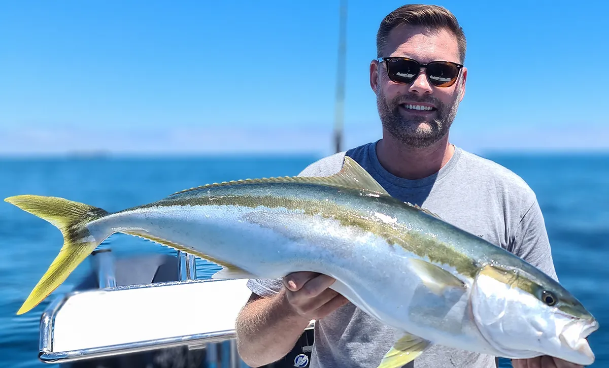 Ultra-light tackle kingfish, simply superb! Andrew from Northbank Boats enjoying the thrill.