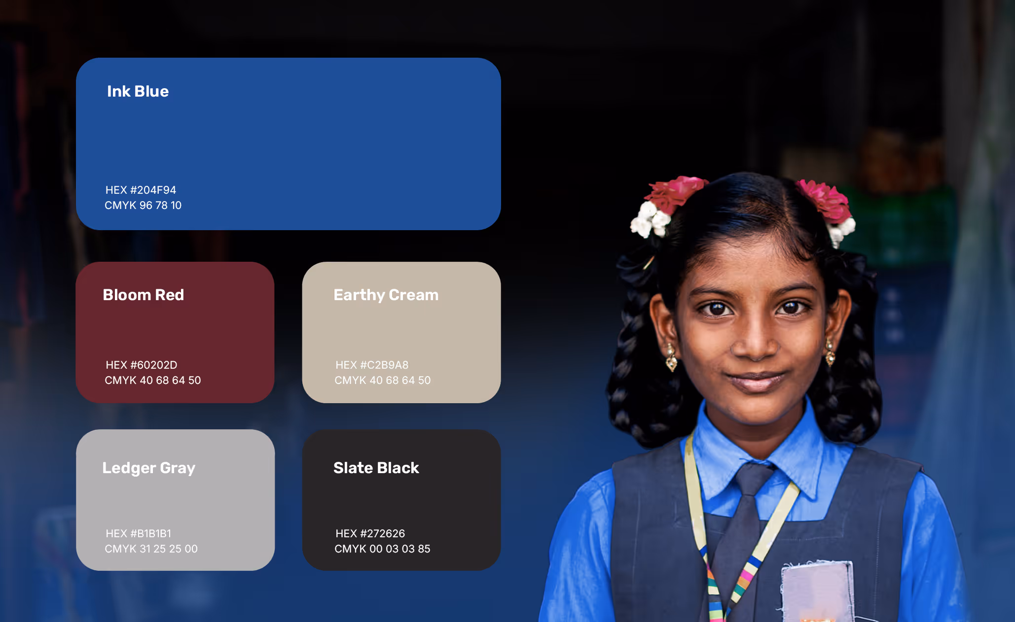 Portrait of a smiling Indian schoolgirl with braided hair and flowers, wearing a blue uniform and tie next to color swatches labeled Ink Blue, Bloom Red, Earthy Cream, Ledger Gray, and Slate Black with corresponding HEX and CMYK codes.