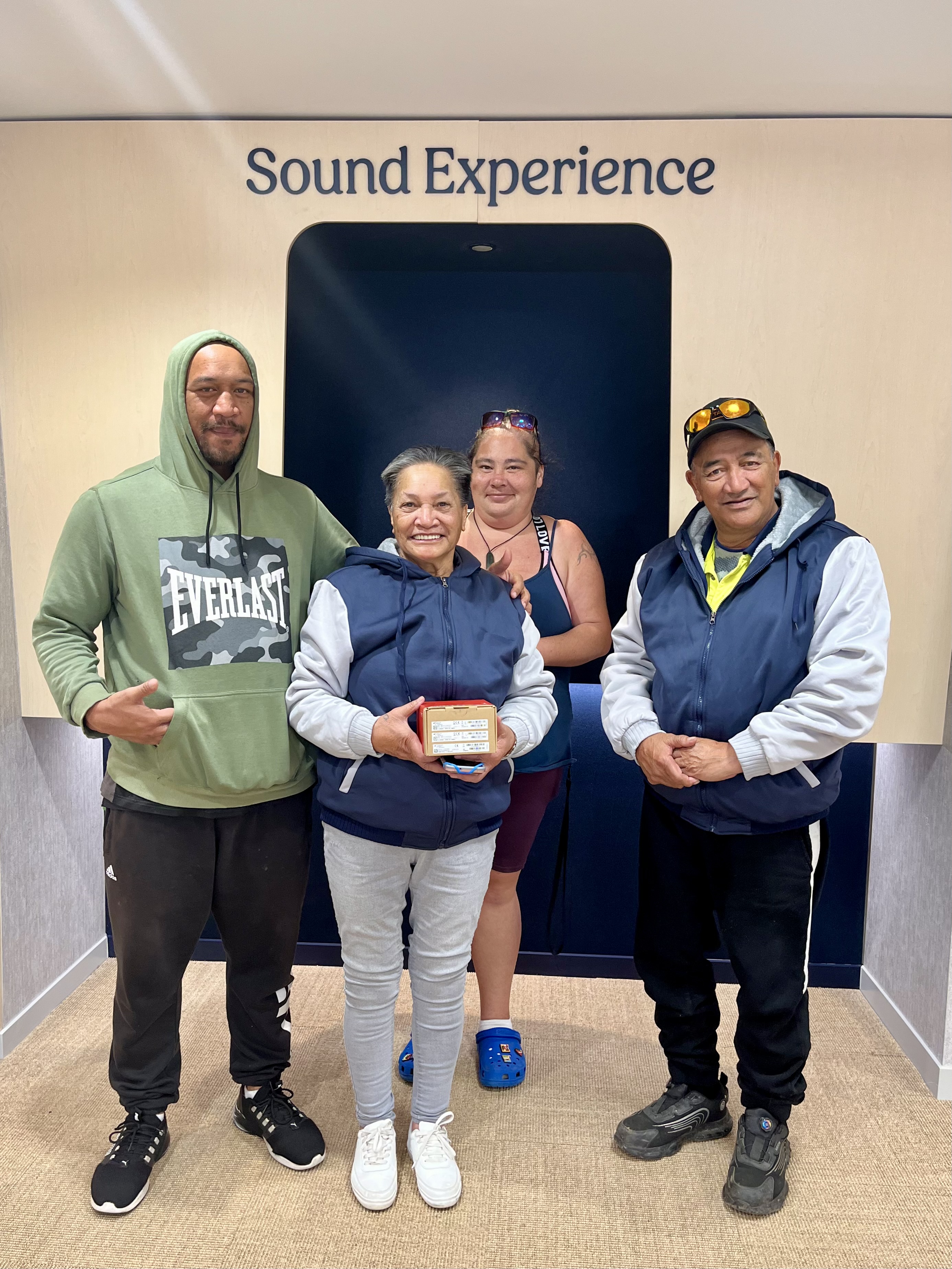 TIna and her family after receiving her hearing aids at Resonate Health Rotorua
