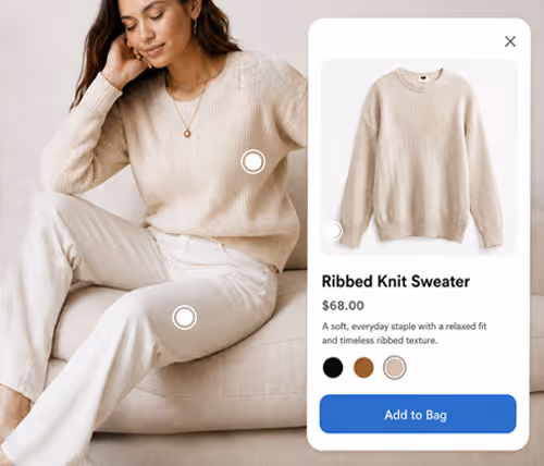Woman in beige ribbed knit sweater and white pants sitting next to product info for sweater with price and add to bag button.