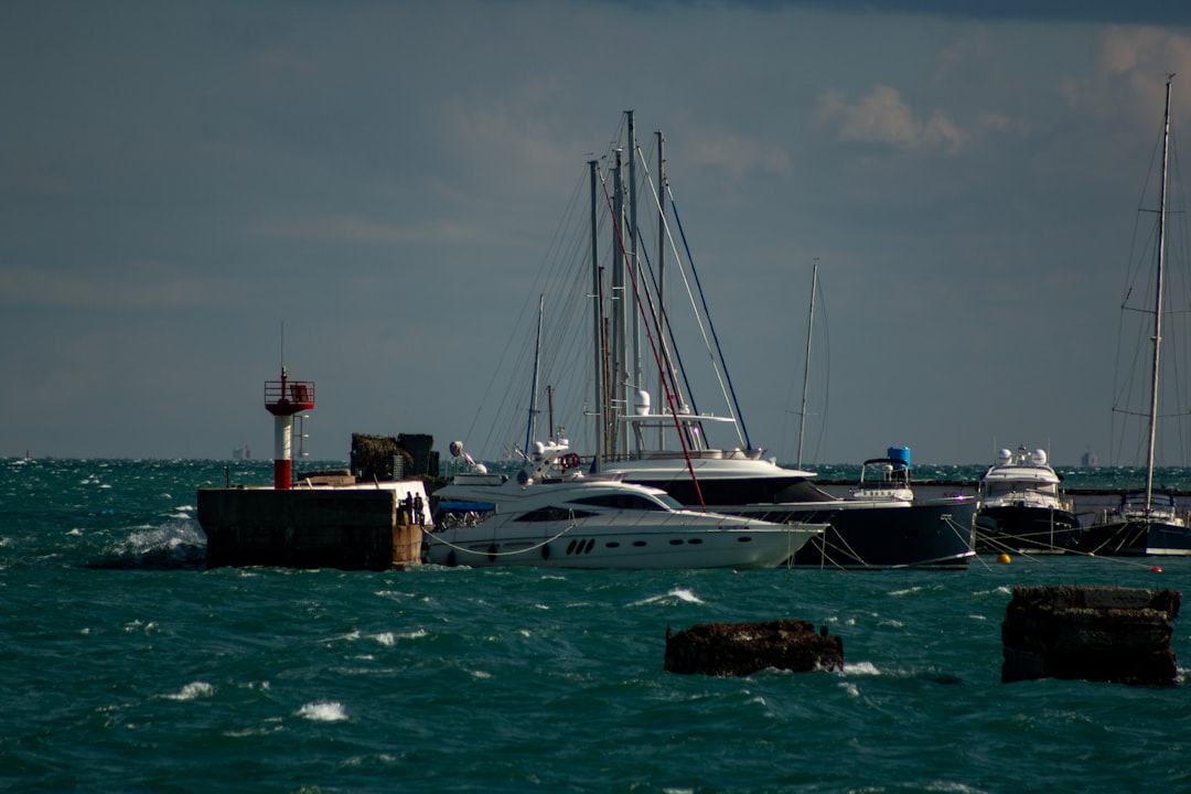 luxury sailboat at a marina - boat and marine insurance luxury sailboat at a marina - boat and marine insurance