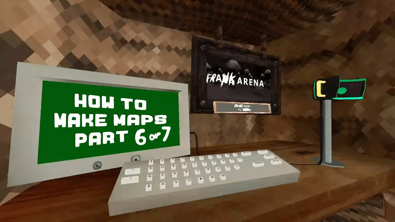 A computer setup featuring a monitor displaying the text 'HOW TO MAKE MAPS PART 6 of 7' on a green background, alongside a screen with the title 'FRAG ARENA.' The scene is set in a textured, cave-like environment.