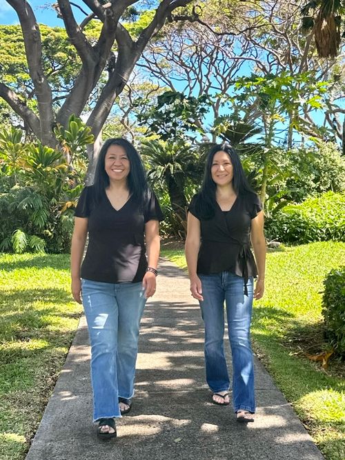 Ana and Leanne walking in a park