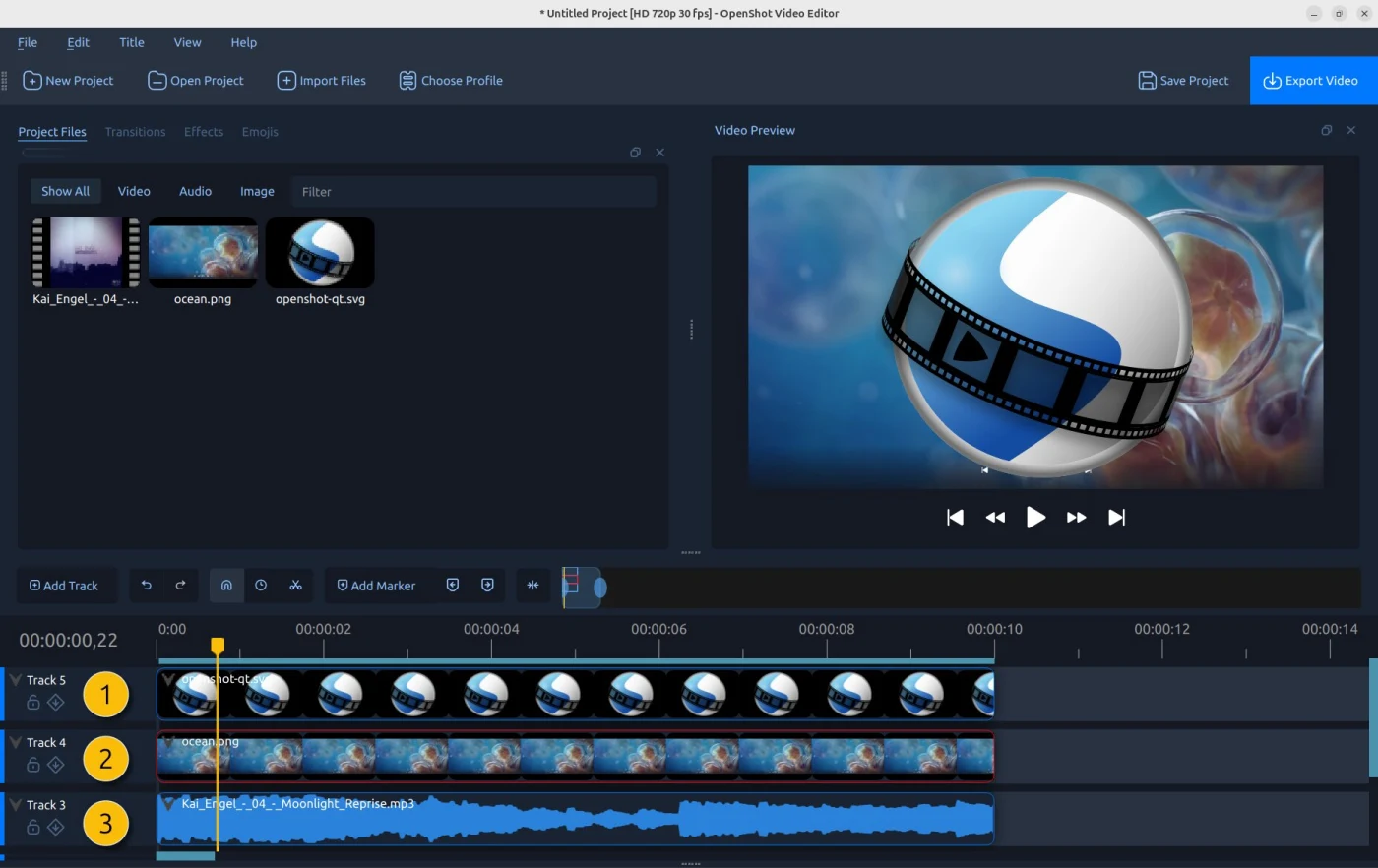 OpenShot main window with project files, preview, and three filled tracks