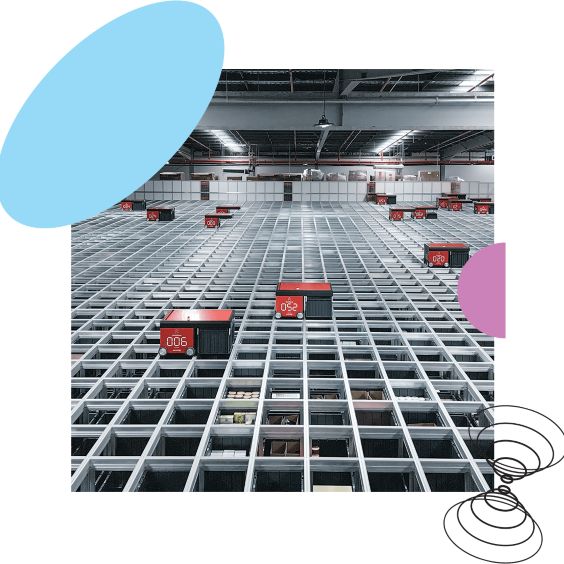 A large warehouse with many red boxes.