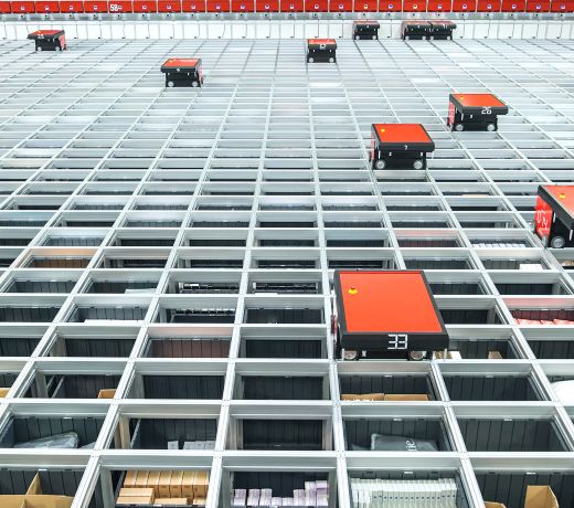 A large room full of orange and black boxes.