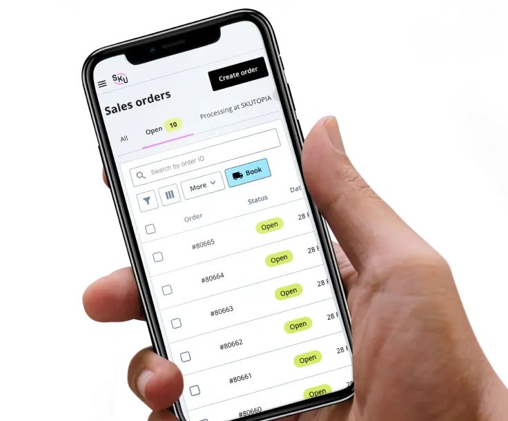 A person holding a smartphone with a screen displaying a list of sales orders.