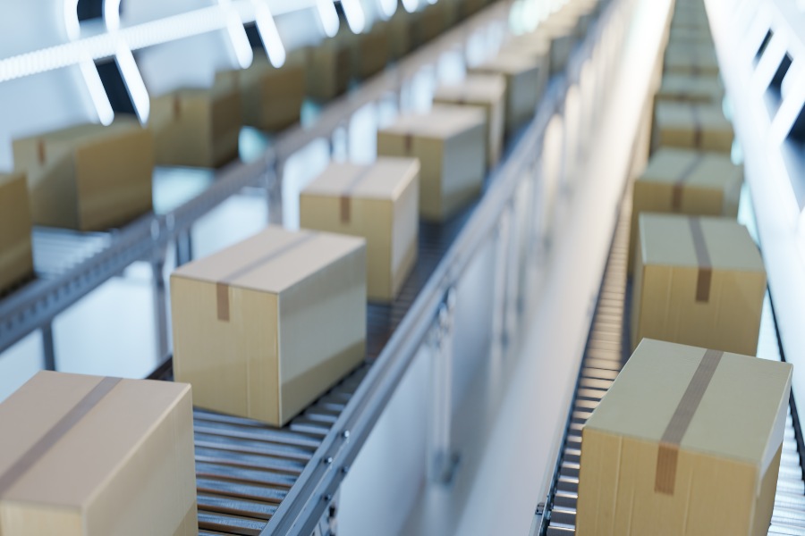 eCommerce Fulfilment vs Combined Fulfilment shown through automated conveyor belts moving sealed parcels.