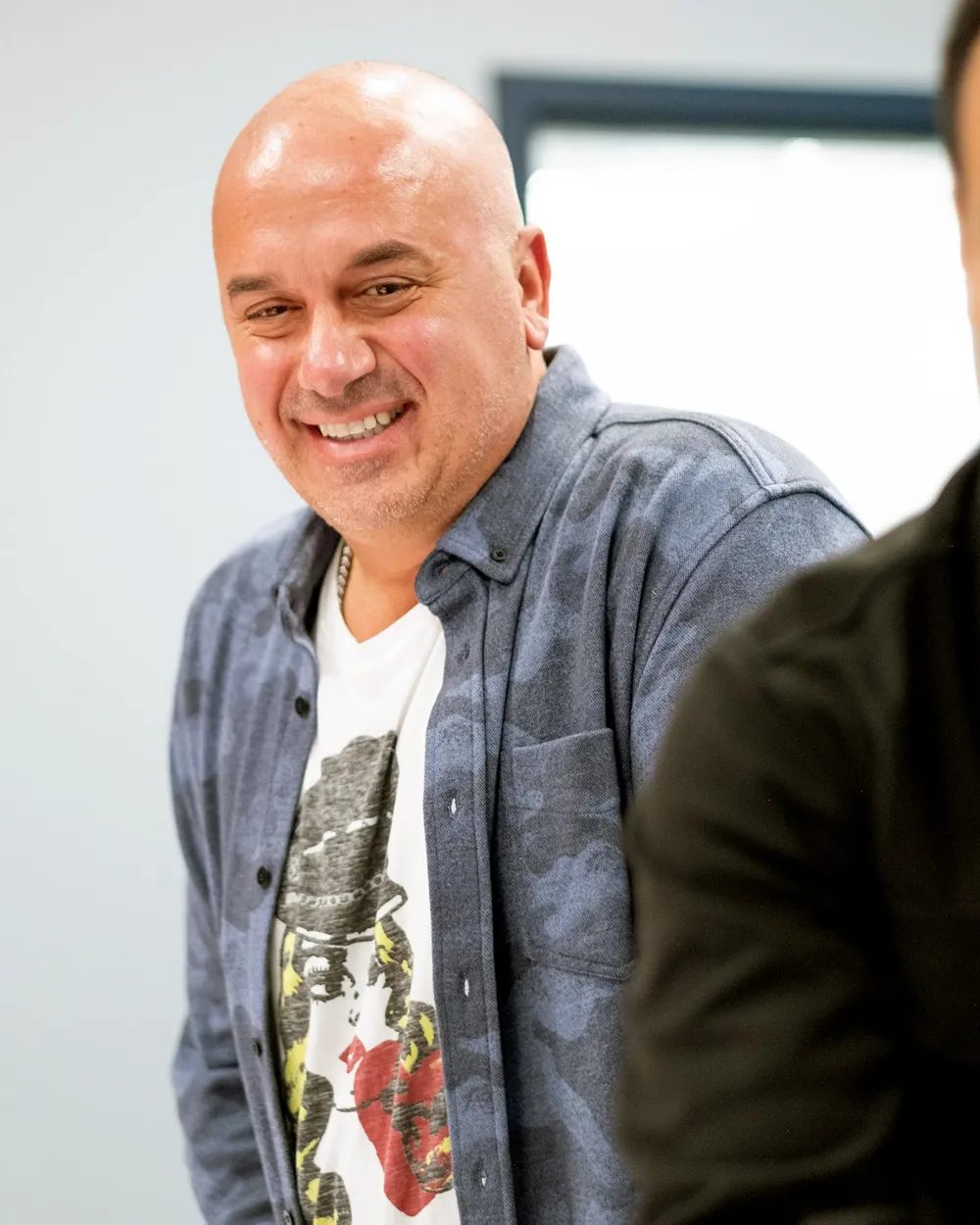 a man smiling for the camera