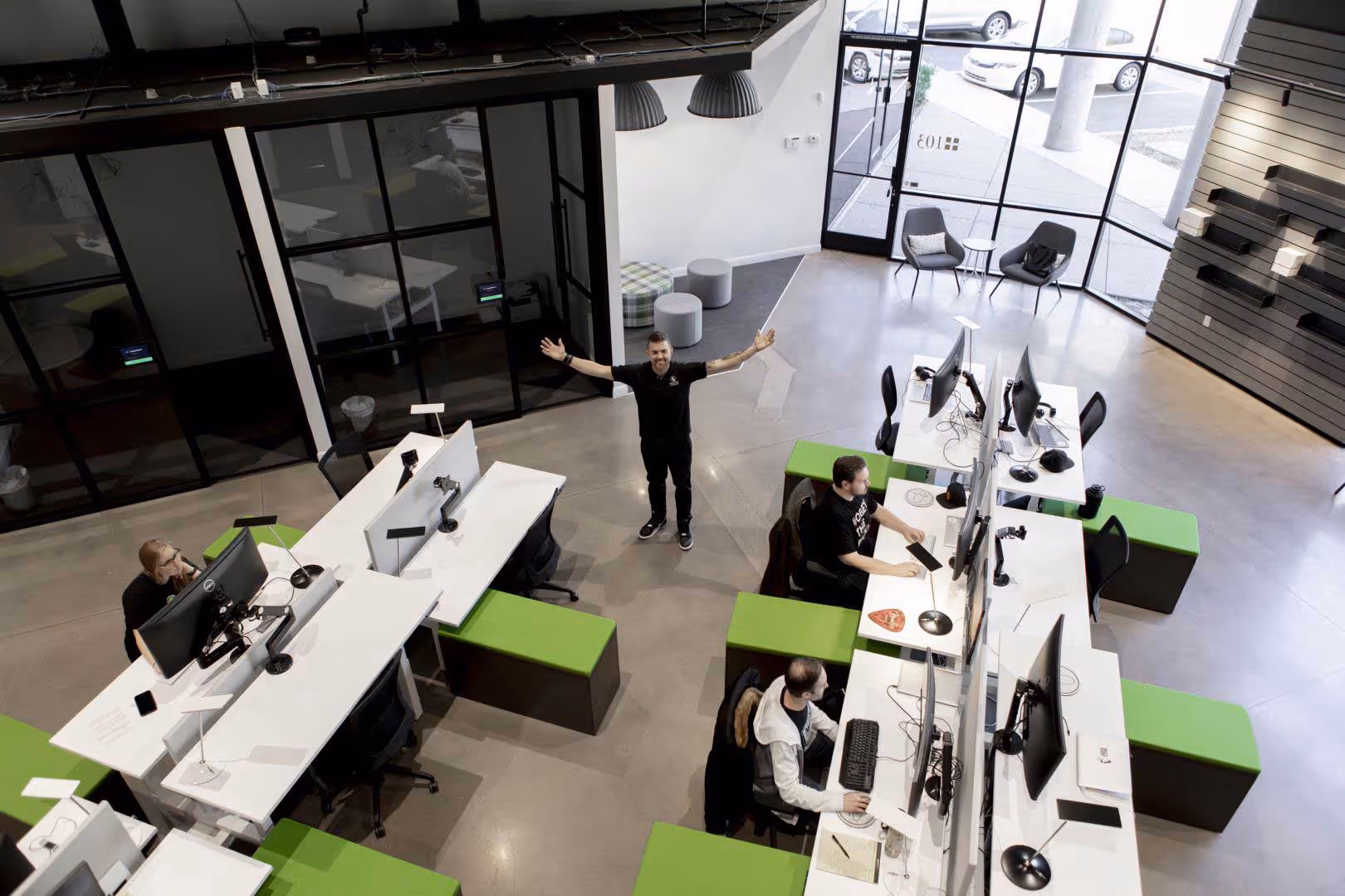 Design Pickle case study header image - Creative design agency office workspace