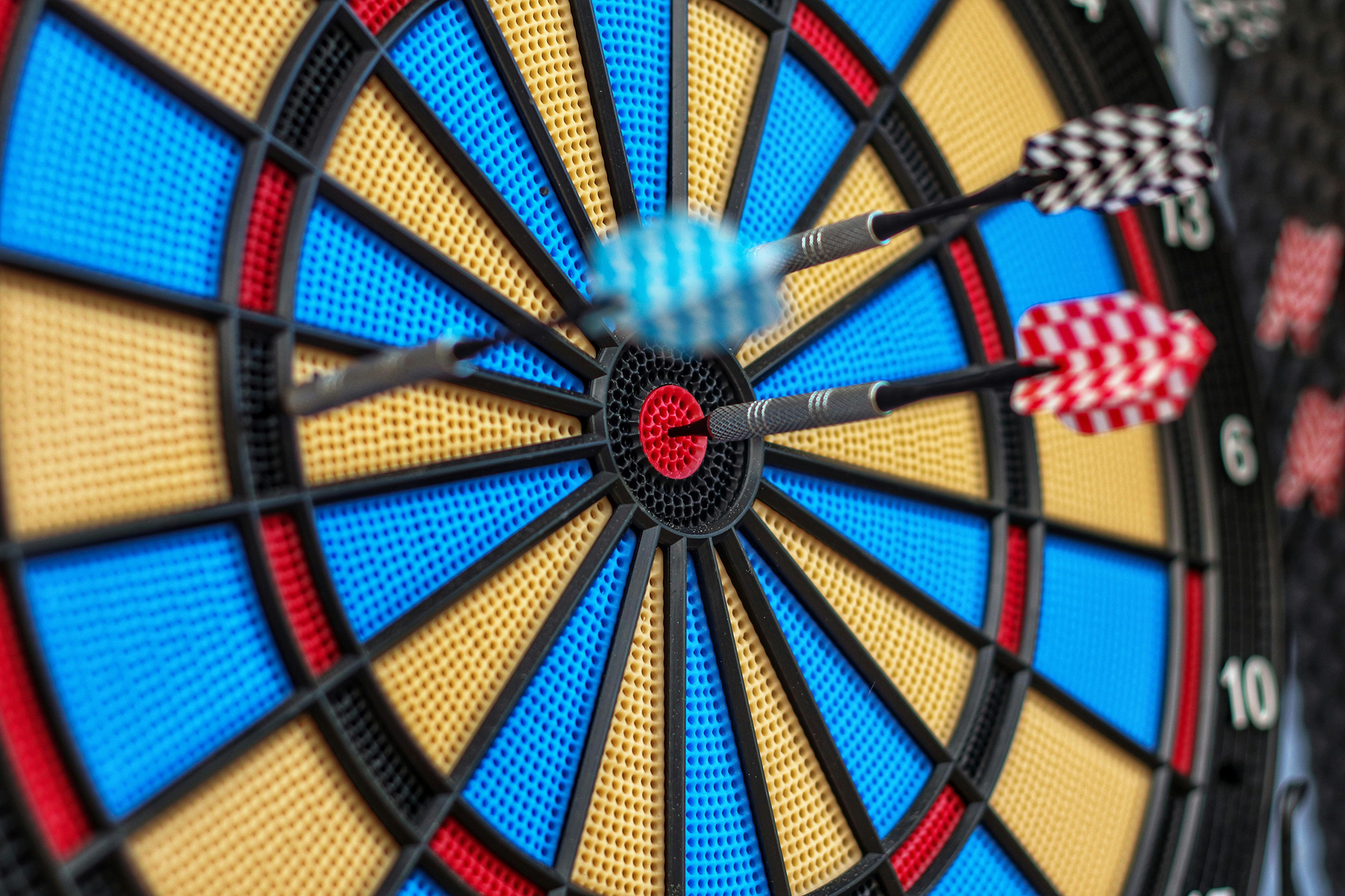 ABM playbook cover image - Dartboard with pins representing targeted account-based marketing strategies