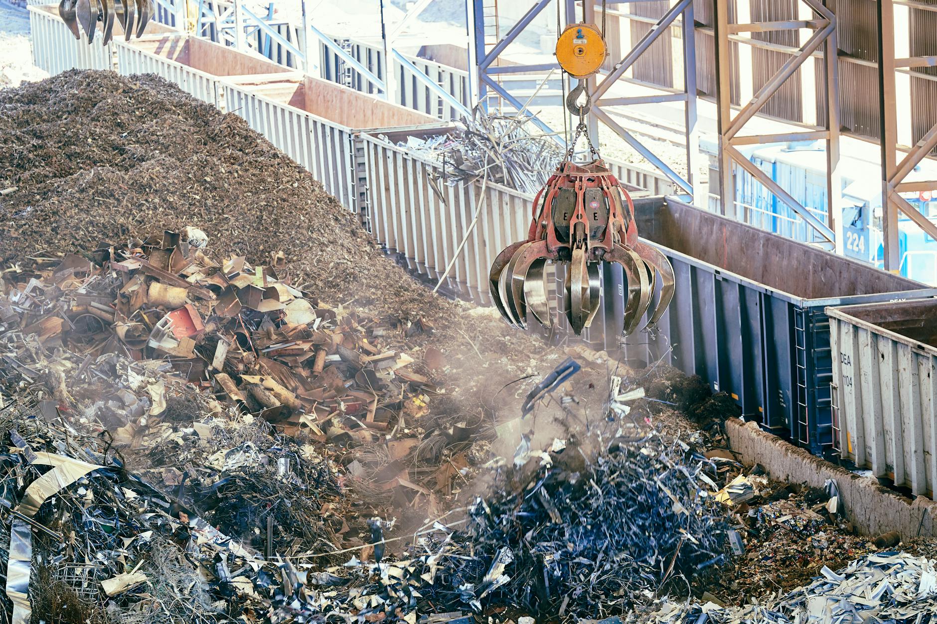 Circular diagram illustrating the post-consumer recycling loop showing a product being used, discarded, collected, sorted, and reprocessed