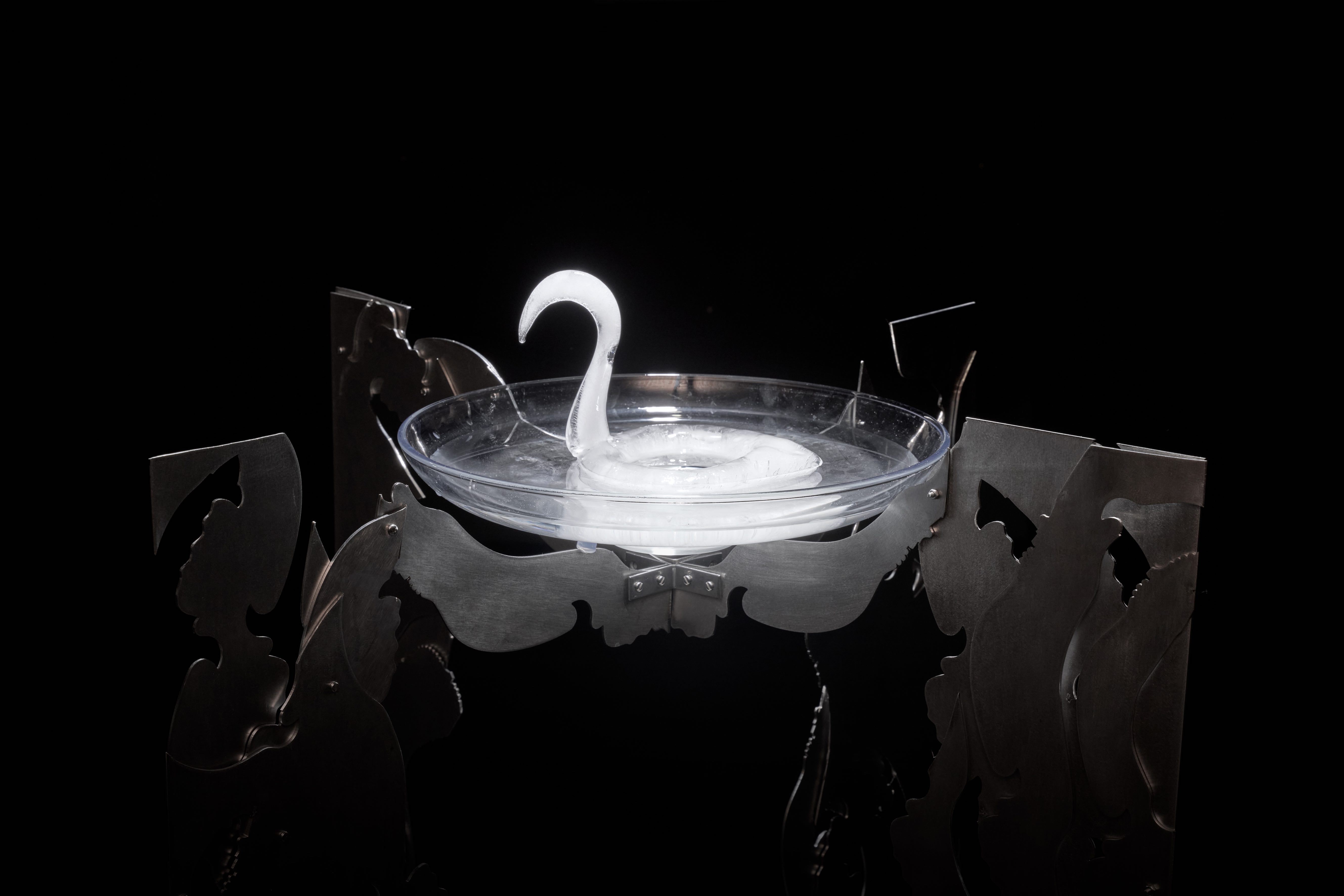 Ice swan in bird bath, artwork, sculpture