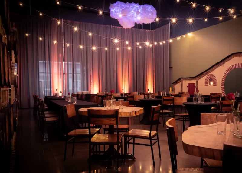 Event space configured for a Valentine's Day dinner event