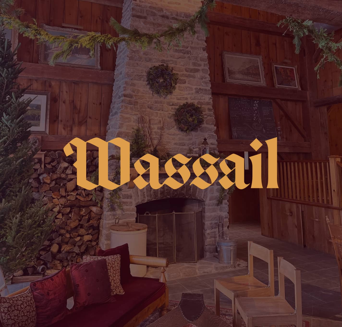 Wassail logo over an image of a fireplace and hearth