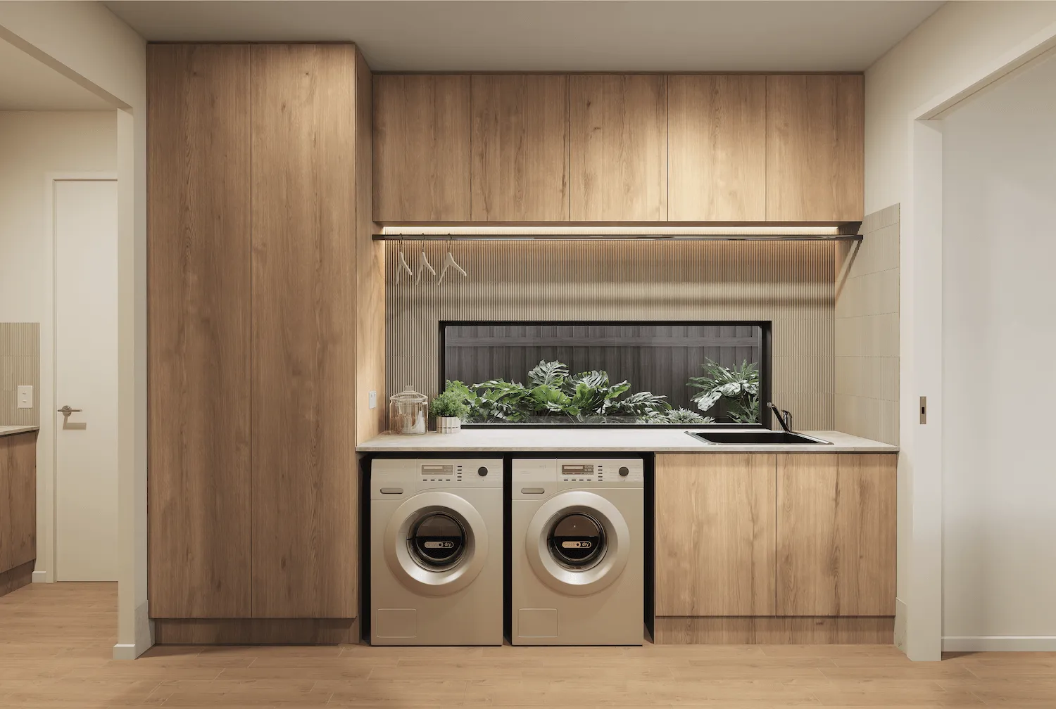 A washer and dryer in a small room.