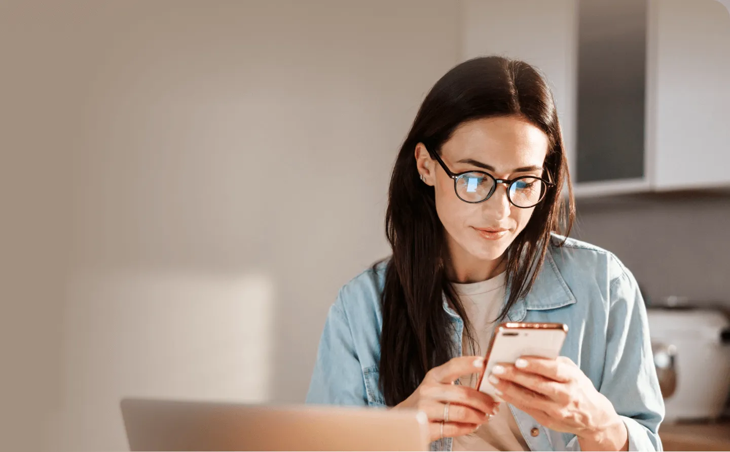 woman smilling using phone