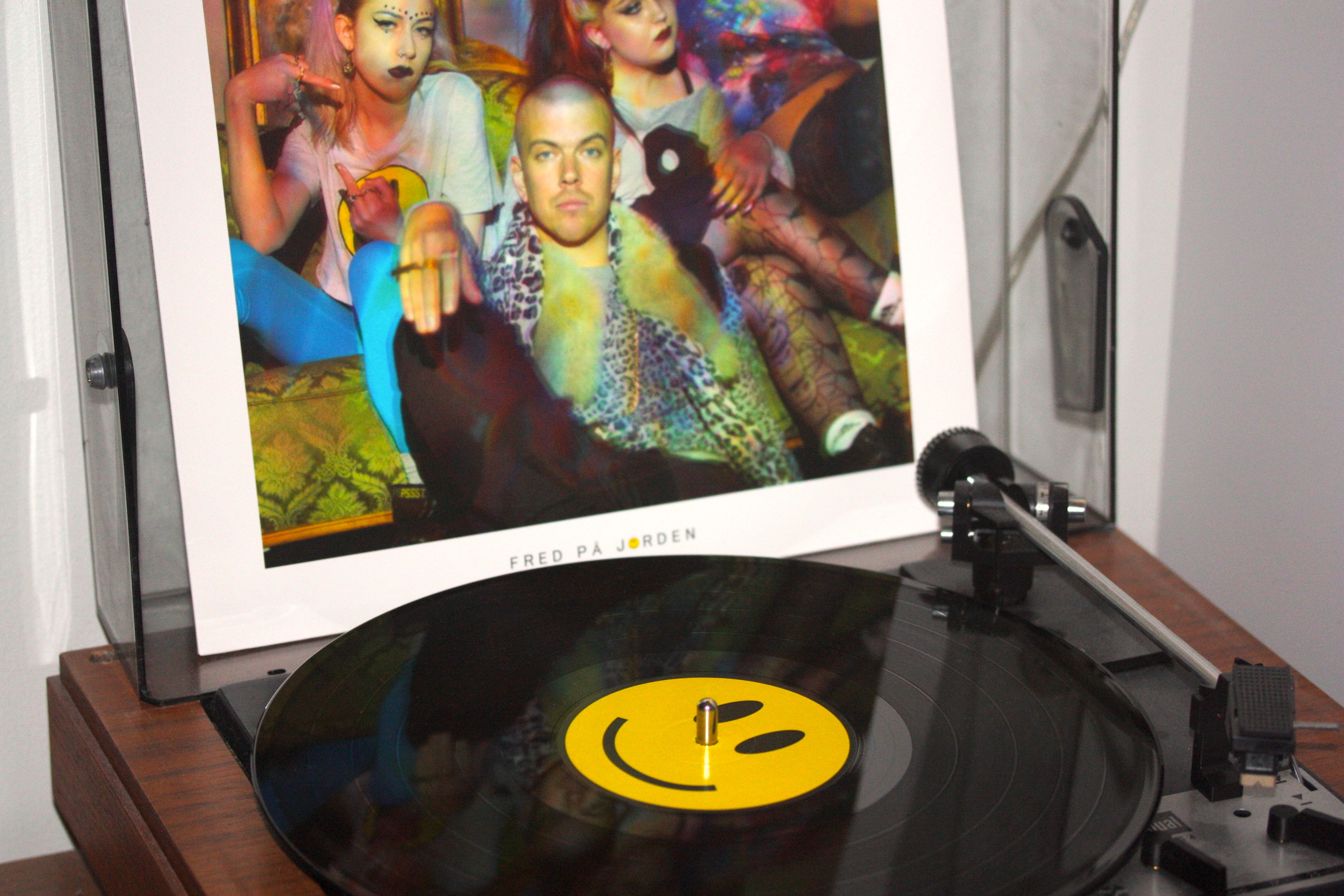 Record player and a vinyl LP.