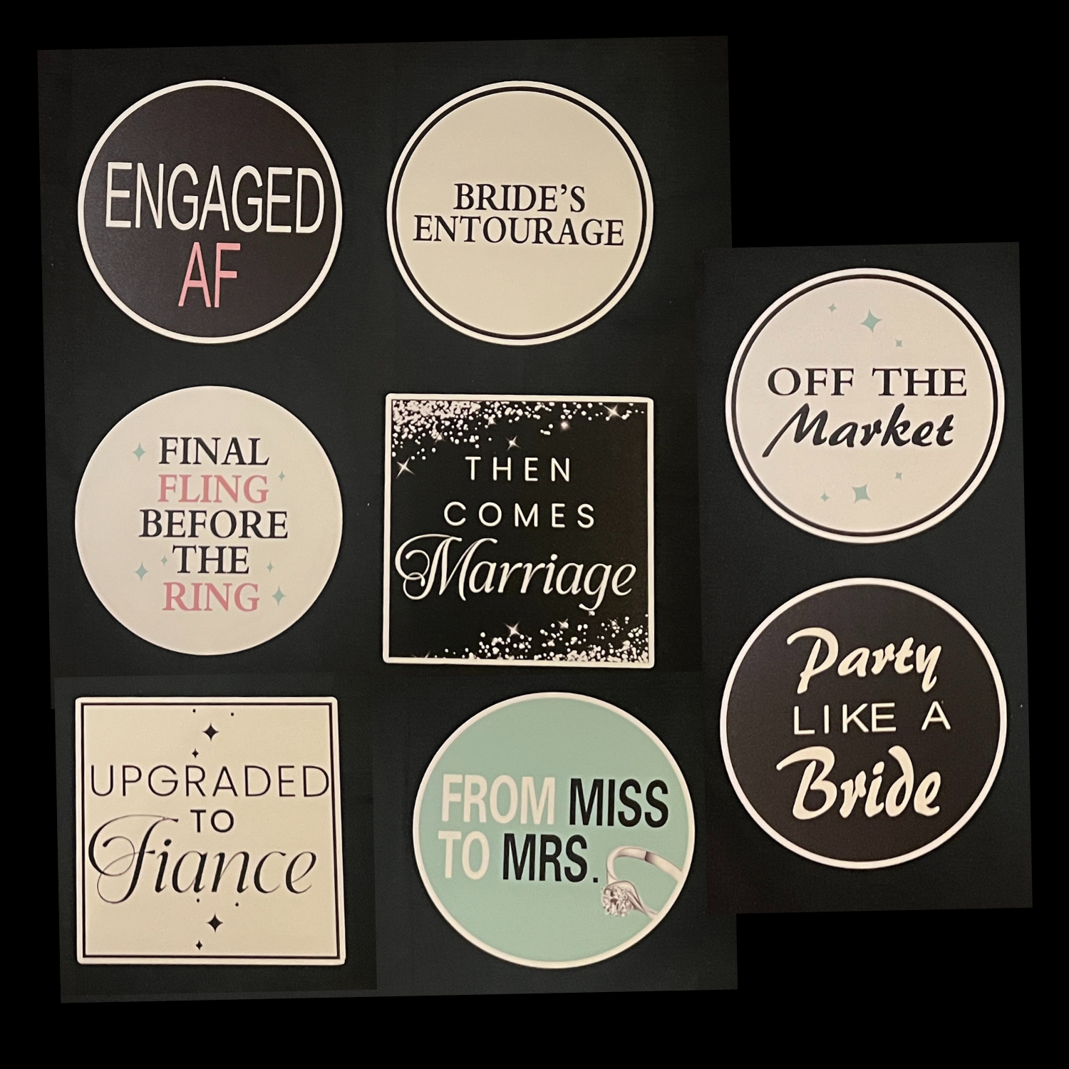 Delicate white 2x6 photo booth strip with three gold-bordered images, light pink floral illustrations in the corners, names Lorena and Sam, and year 2025 in elegant script