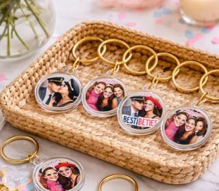 Two color photo booth strips featuring women in elegant dresses posing in front of a leafy green backdrop