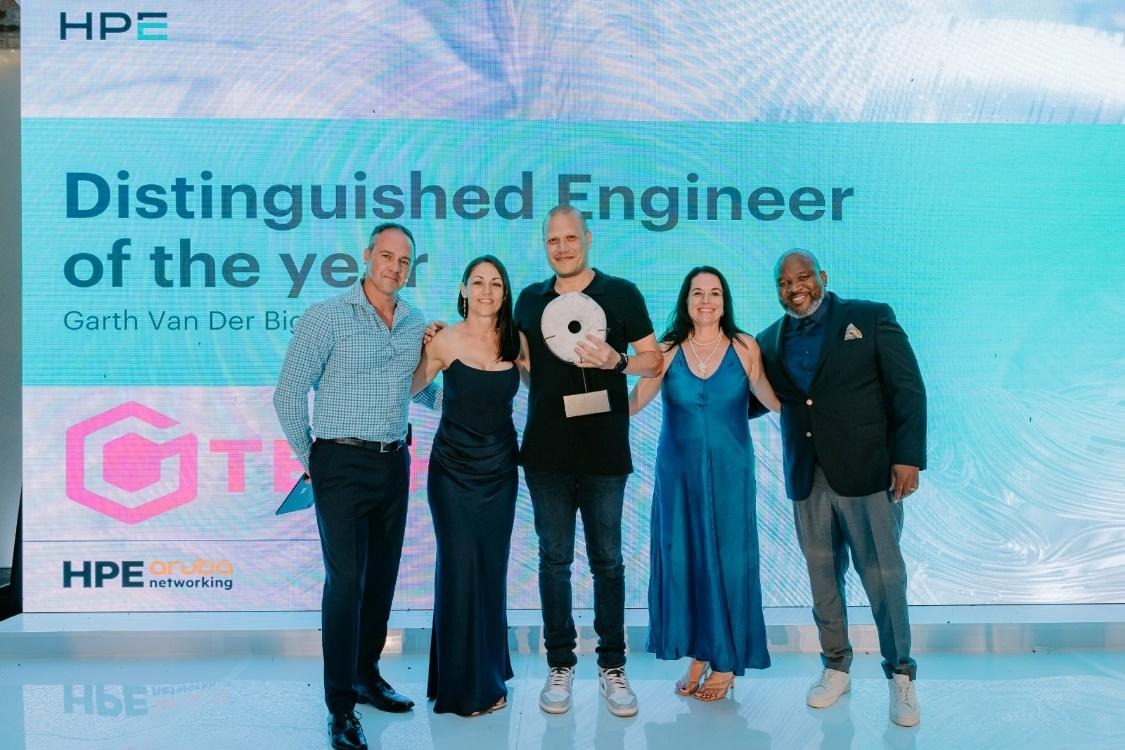 CGTech team receiving HPE Aruba Networking Gold Partner award at industry event