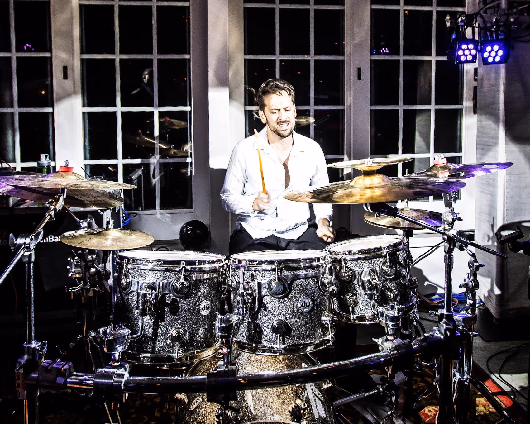 Jonathan Wiegratz playing a sparkle drum set at Wychmere Beach Club.