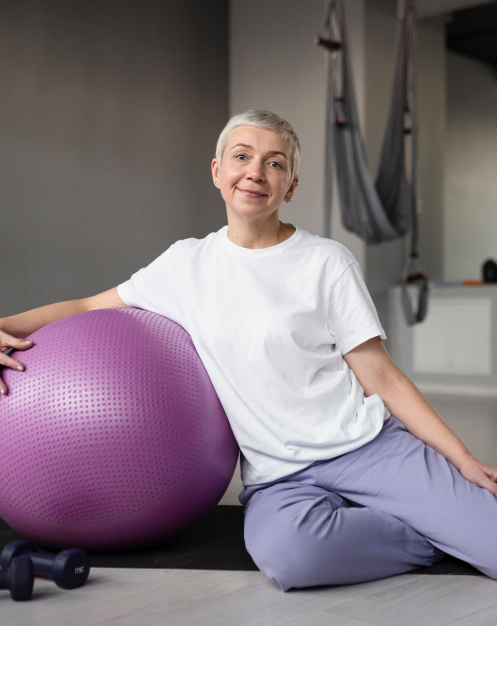 foto de mulher de 40 anos fazendo pilates