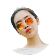 Woman wearing stylish orange-tinted sunglasses with sunset reflection