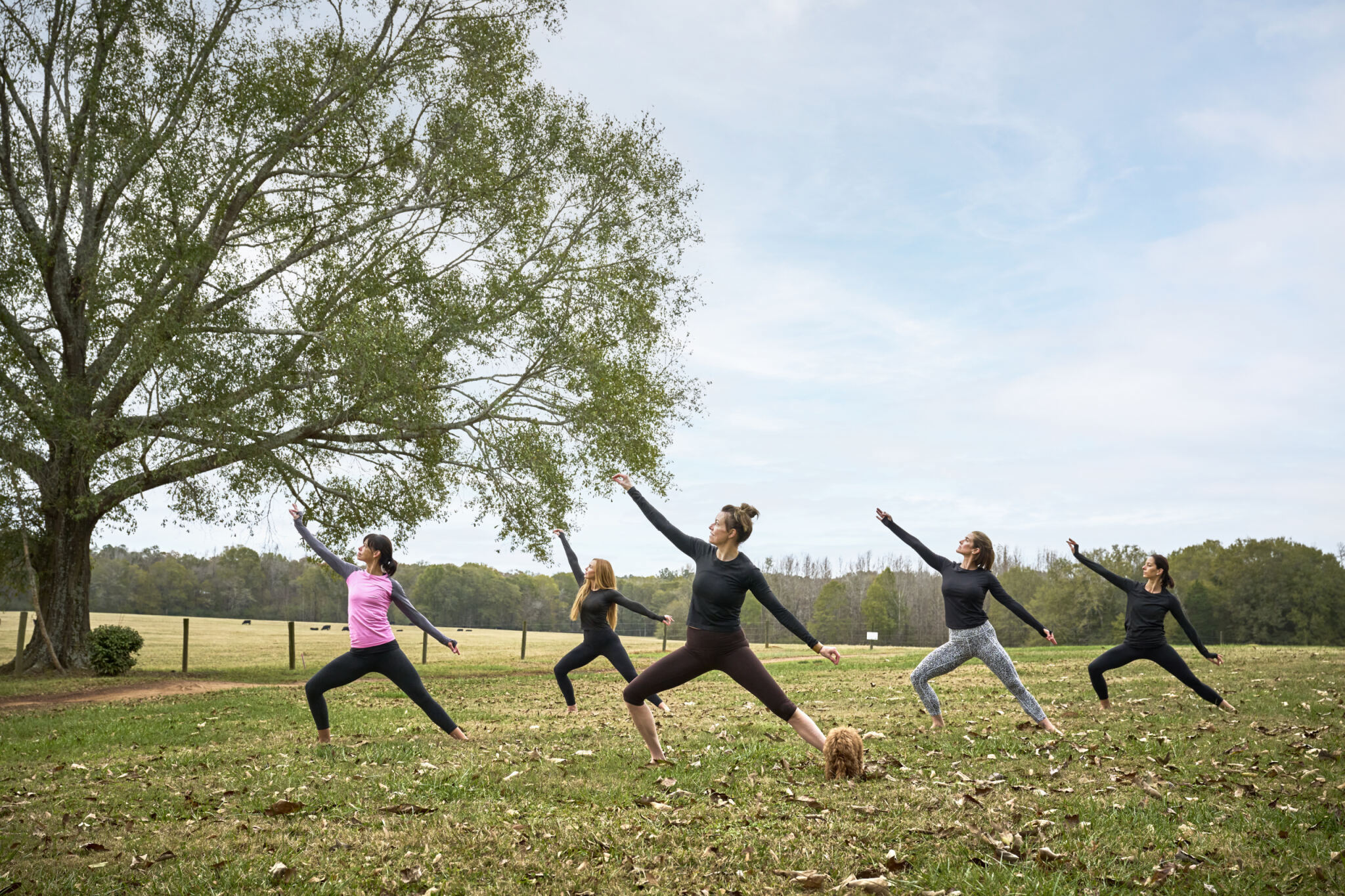 a girl sitting near tent