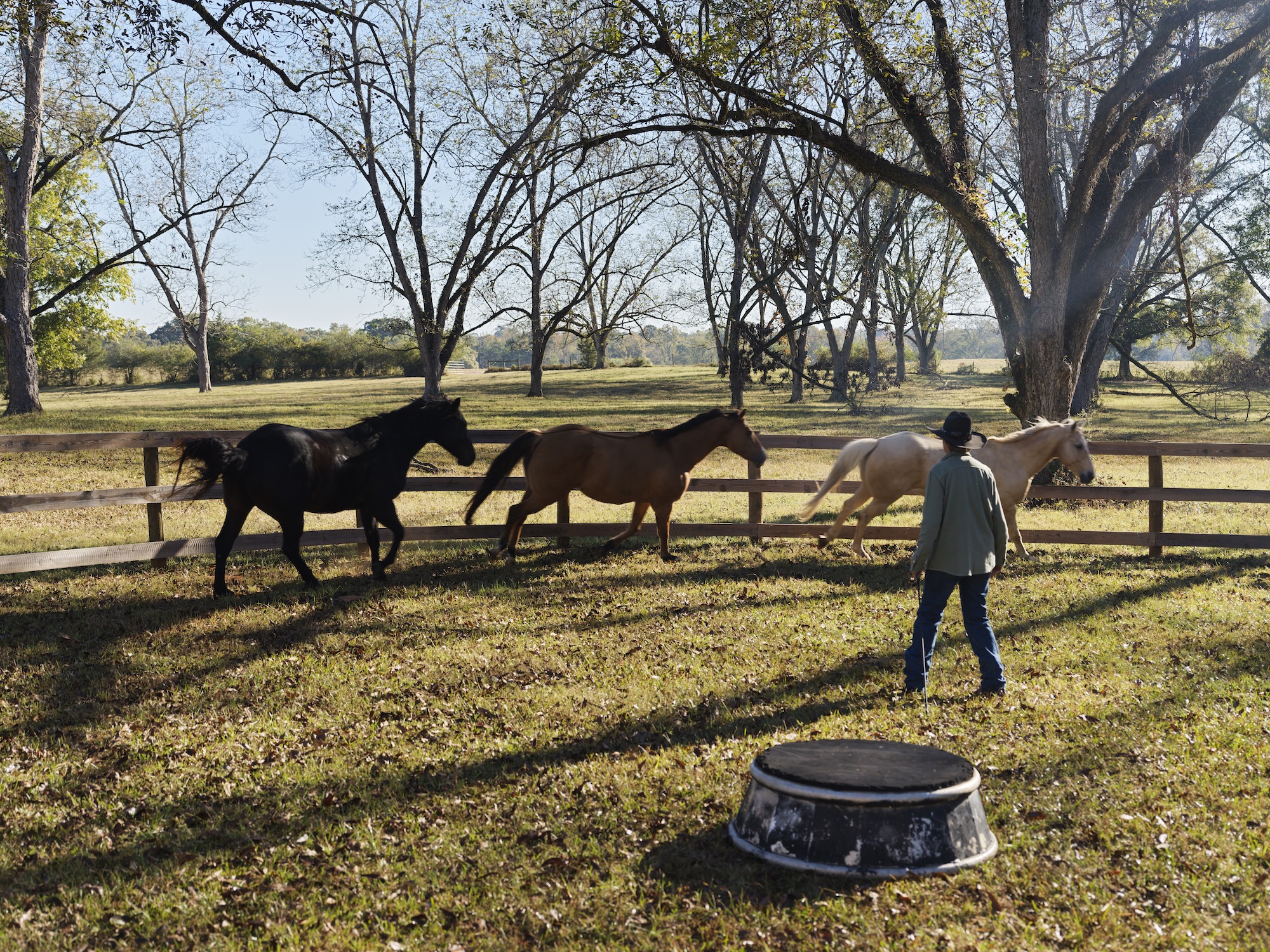 a girl sitting near tent