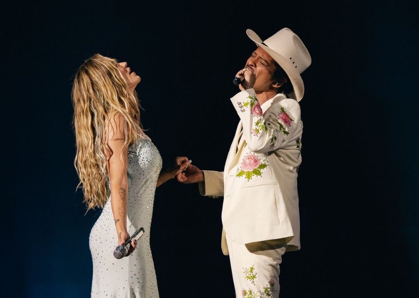 Bruno Mars Joins KAROL G Onstage at SoFi Stadium for First Live "Still" Performance