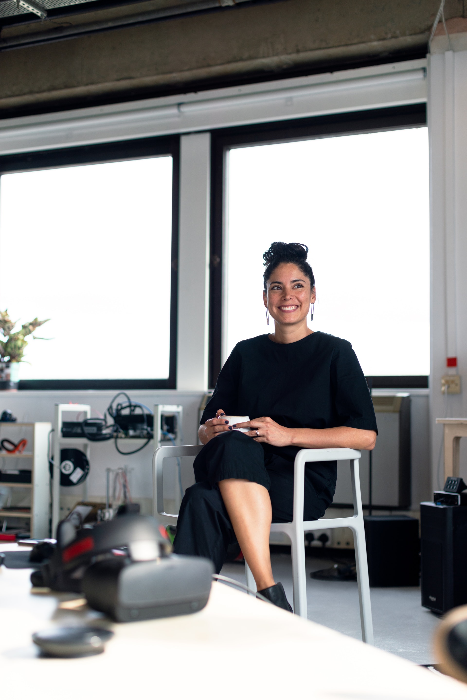 Happy business woman enjoying coffee