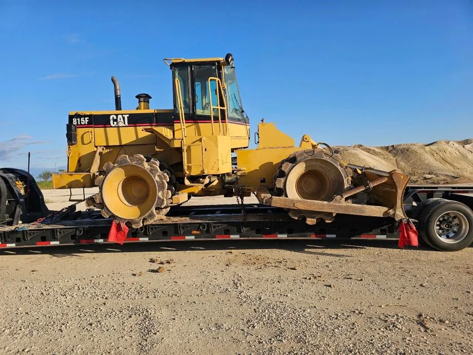 RGN truck with yellow load