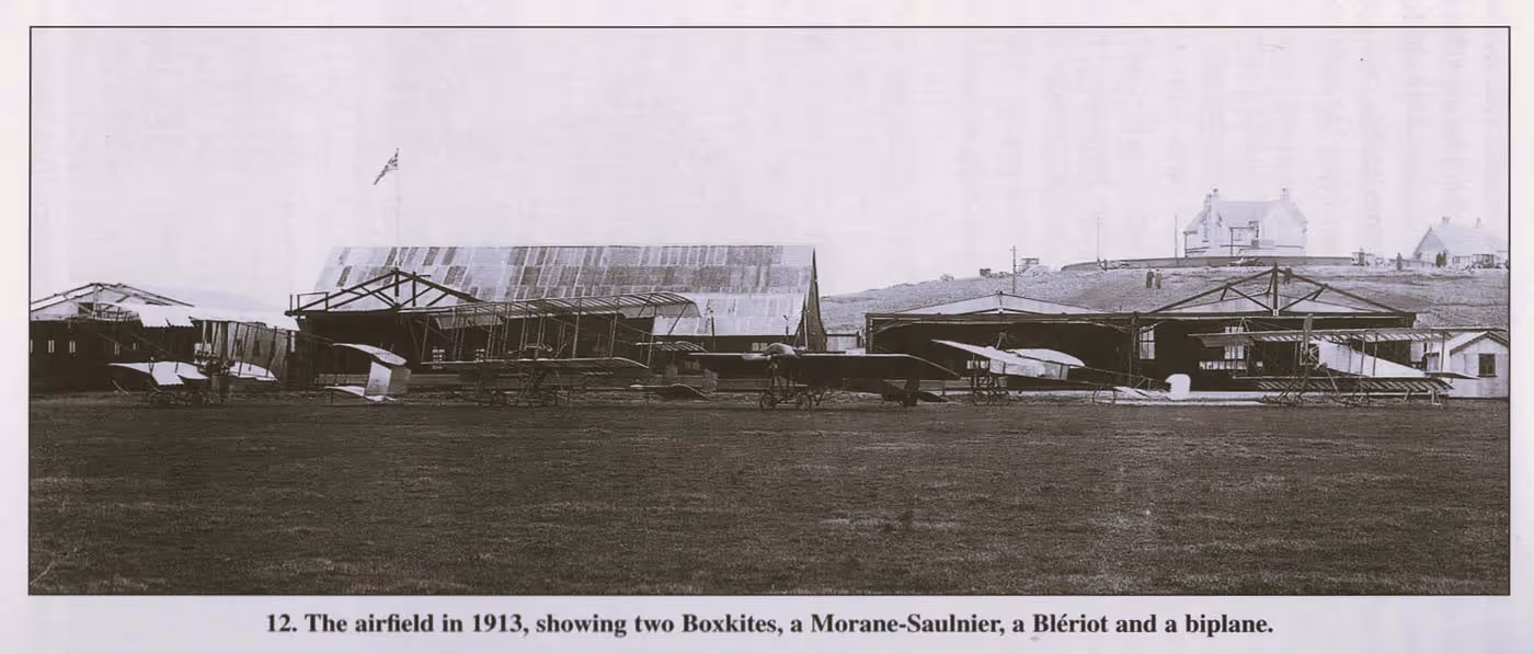 An old black and white image of an airfield