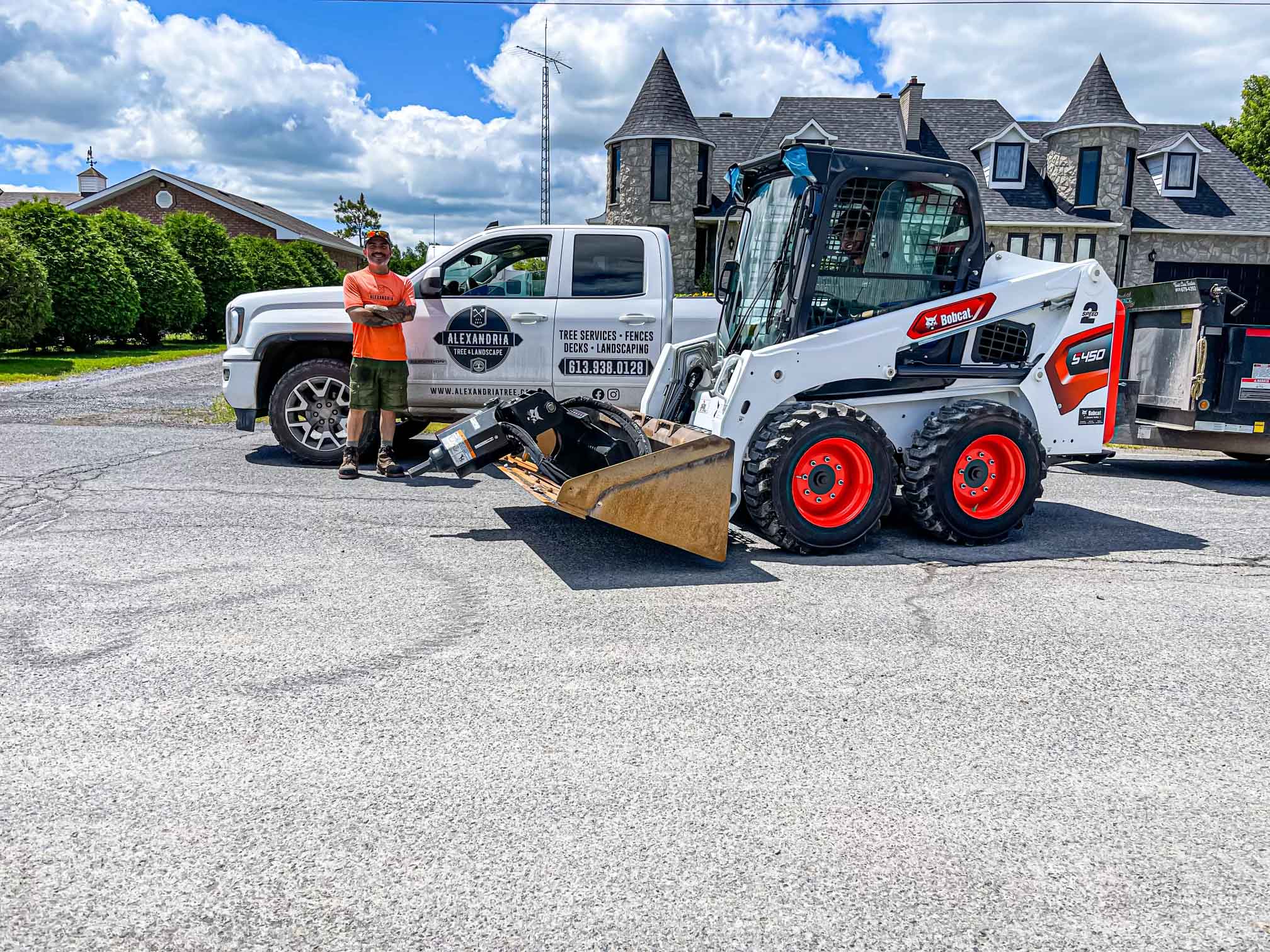 Patrick, owner of Alexandra Tree Services, in front of machinery.