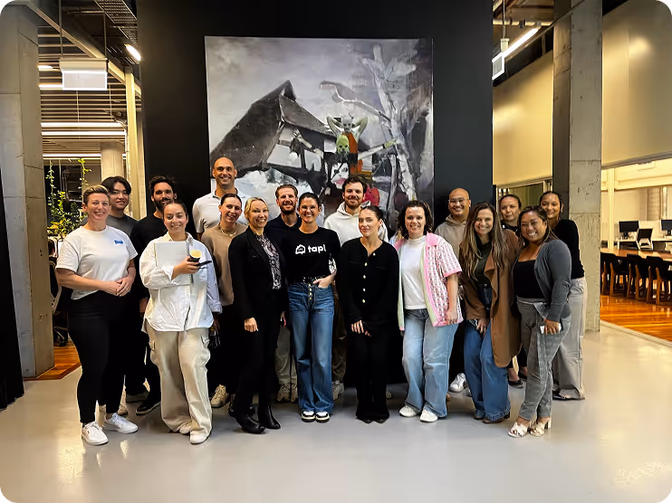 Tapi team visiting customer offices — meeting face-to-face, sharing laughs, and strengthening partnerships with property managers in their own workspace.