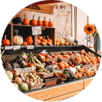 Organic retailer shelves with fruit and vegetables, image.
