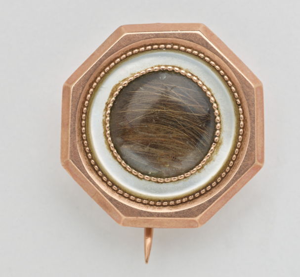 A close up of a pinAI-generated content may be incorrect.