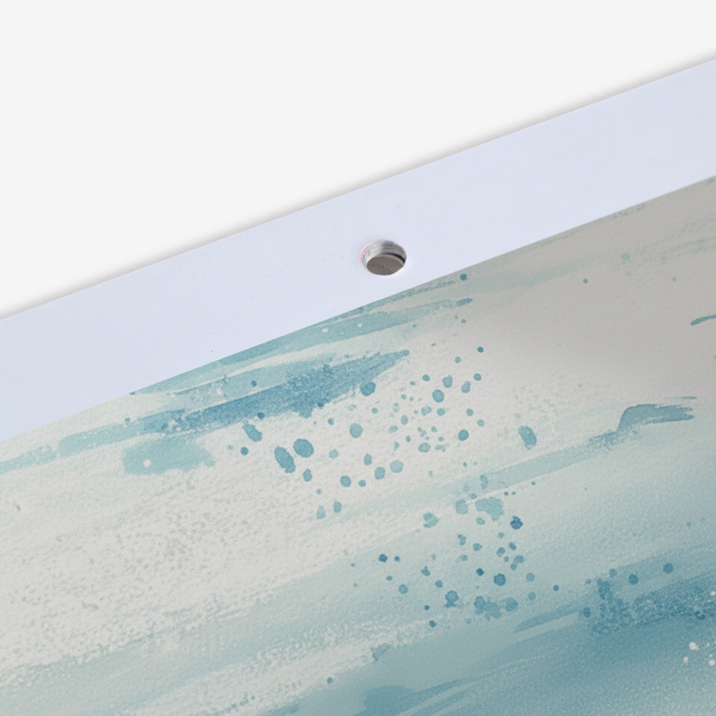 A calendar on a table with other items