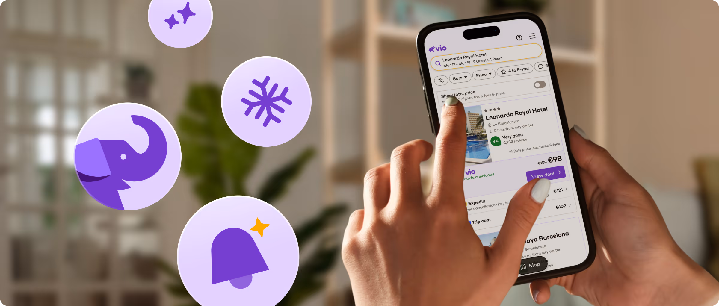User selecting hotel deals in the Vio mobile app on a smartphone at home