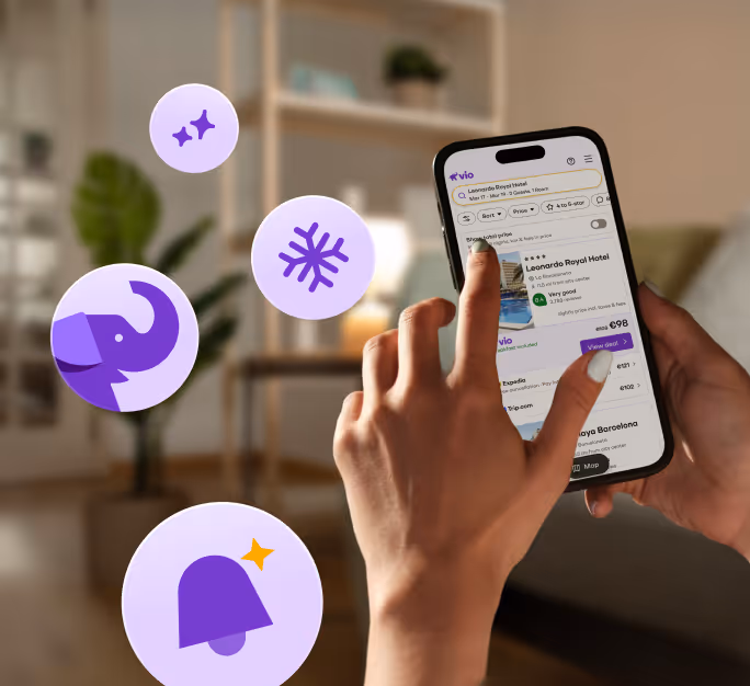 User selecting hotel deals in the Vio mobile app on a smartphone at home