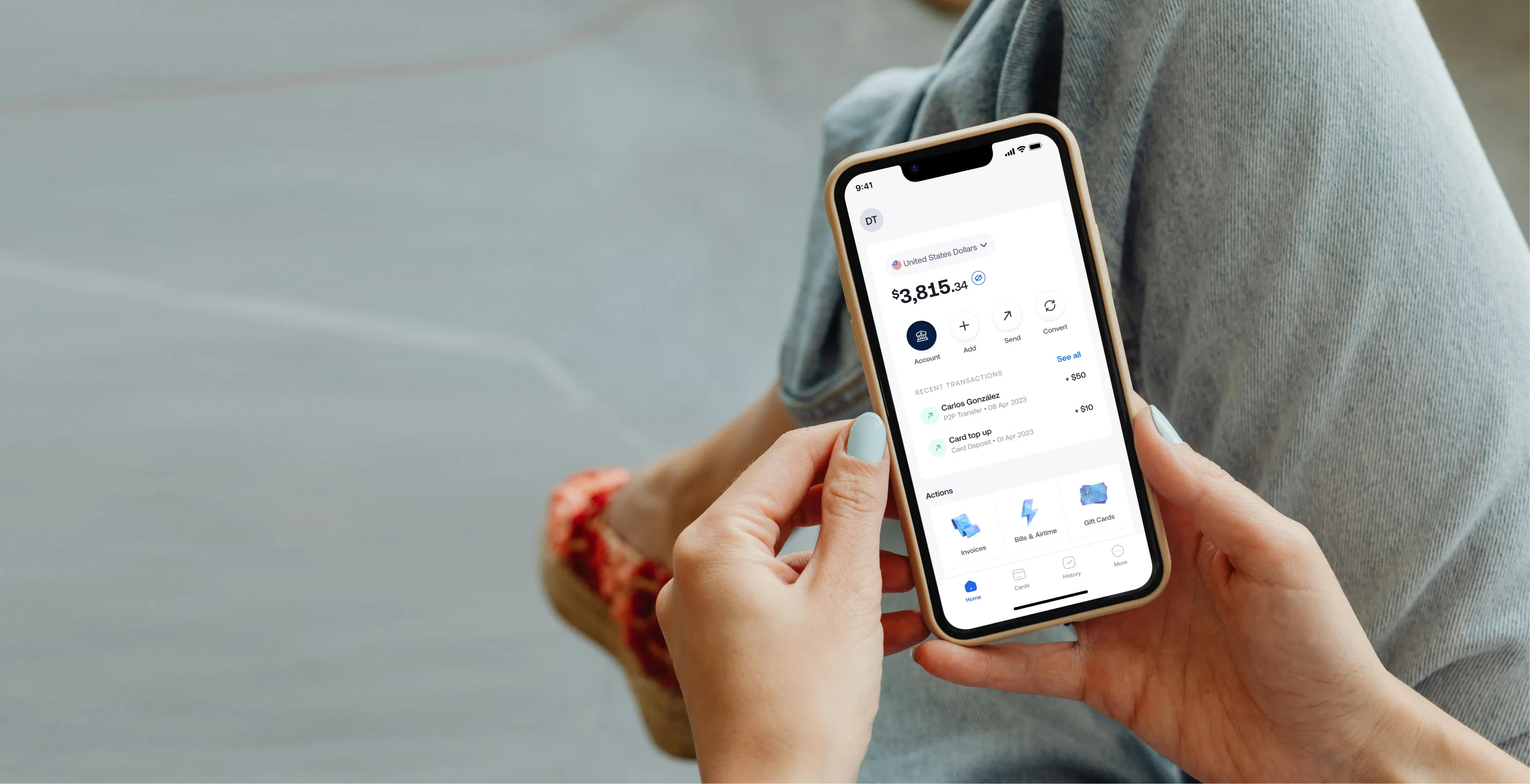 Person holding phone showing account balance of $3,815 with recent transactions and payment options.