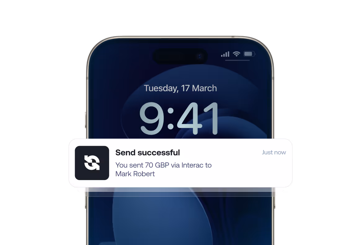 Phone showing notification: Send successful, you sent 70 GBP via Interac to Mark Robert just now.