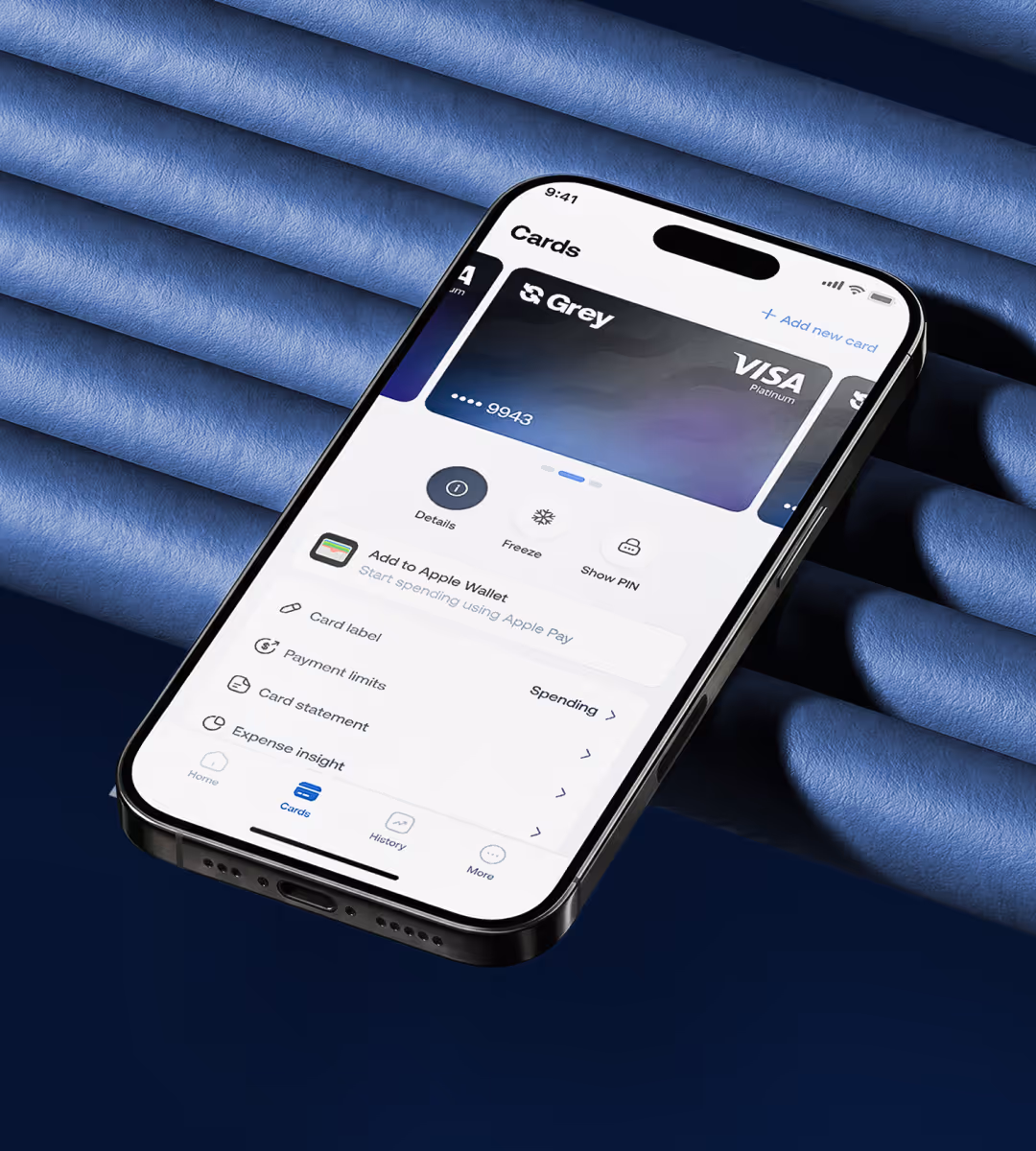 Smartphone displaying a Grey Visa Platinum card with options to add to Apple Wallet and manage card settings.