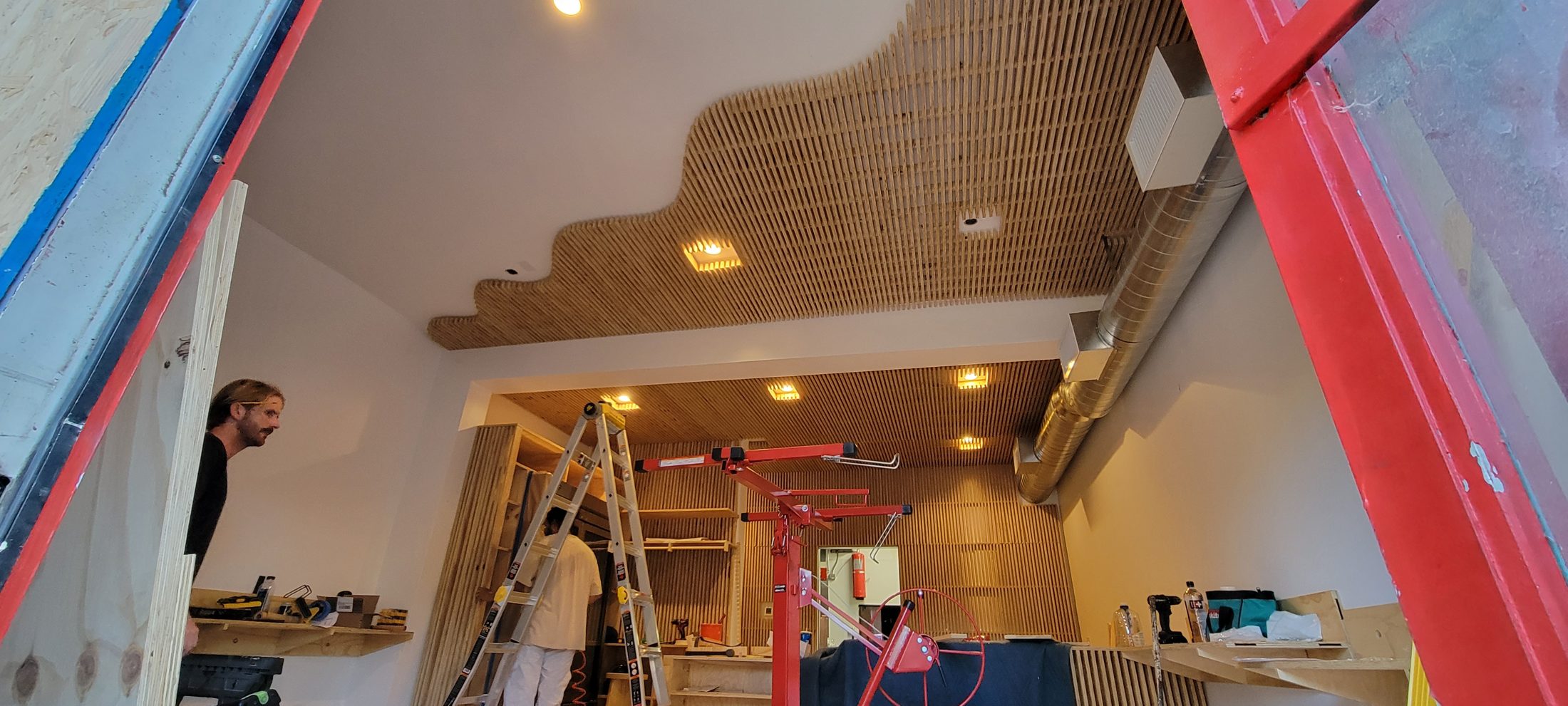 Interior roof detail with carved cornice under construction