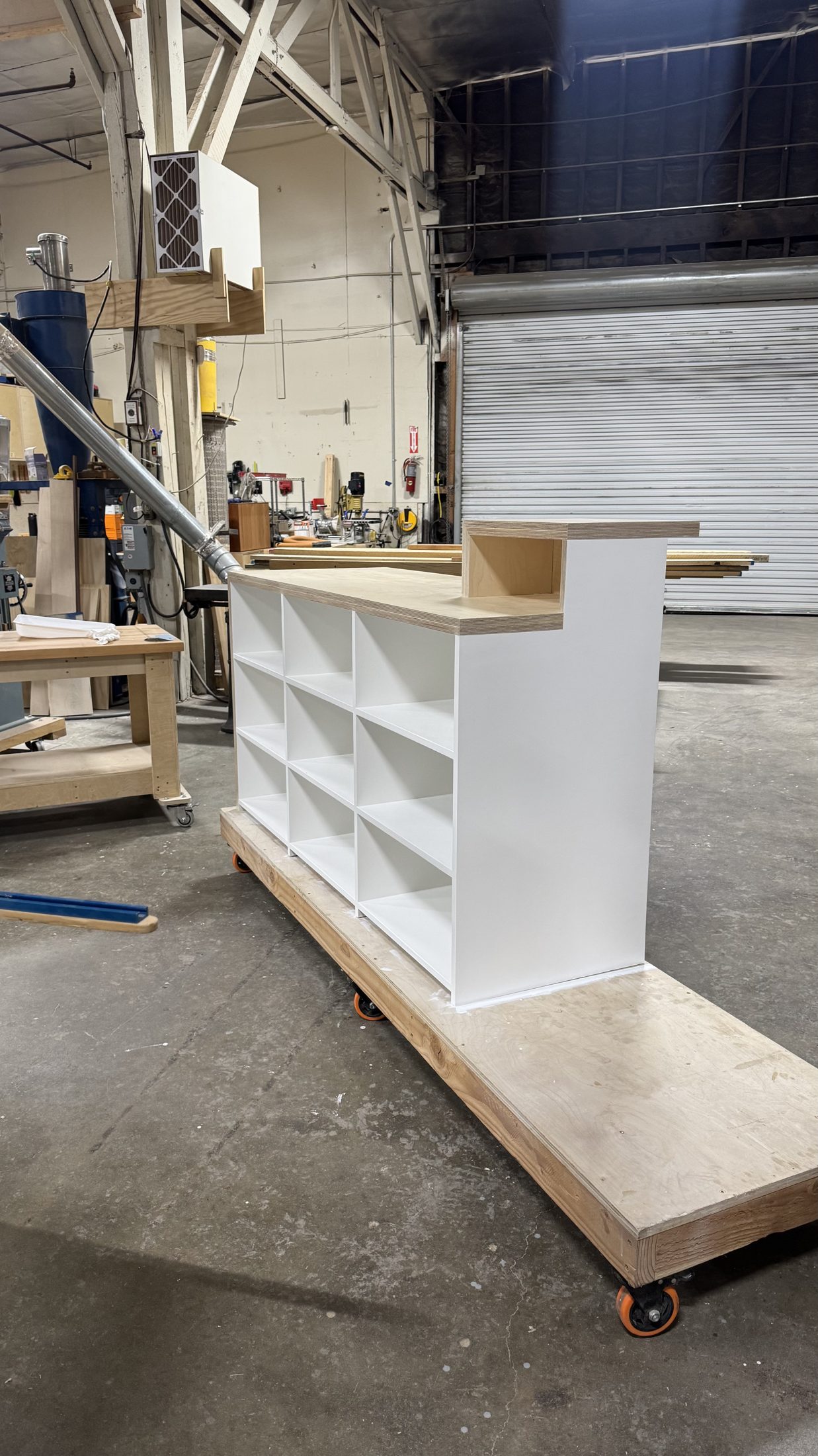 Painted counter fixture on casters in the shop
