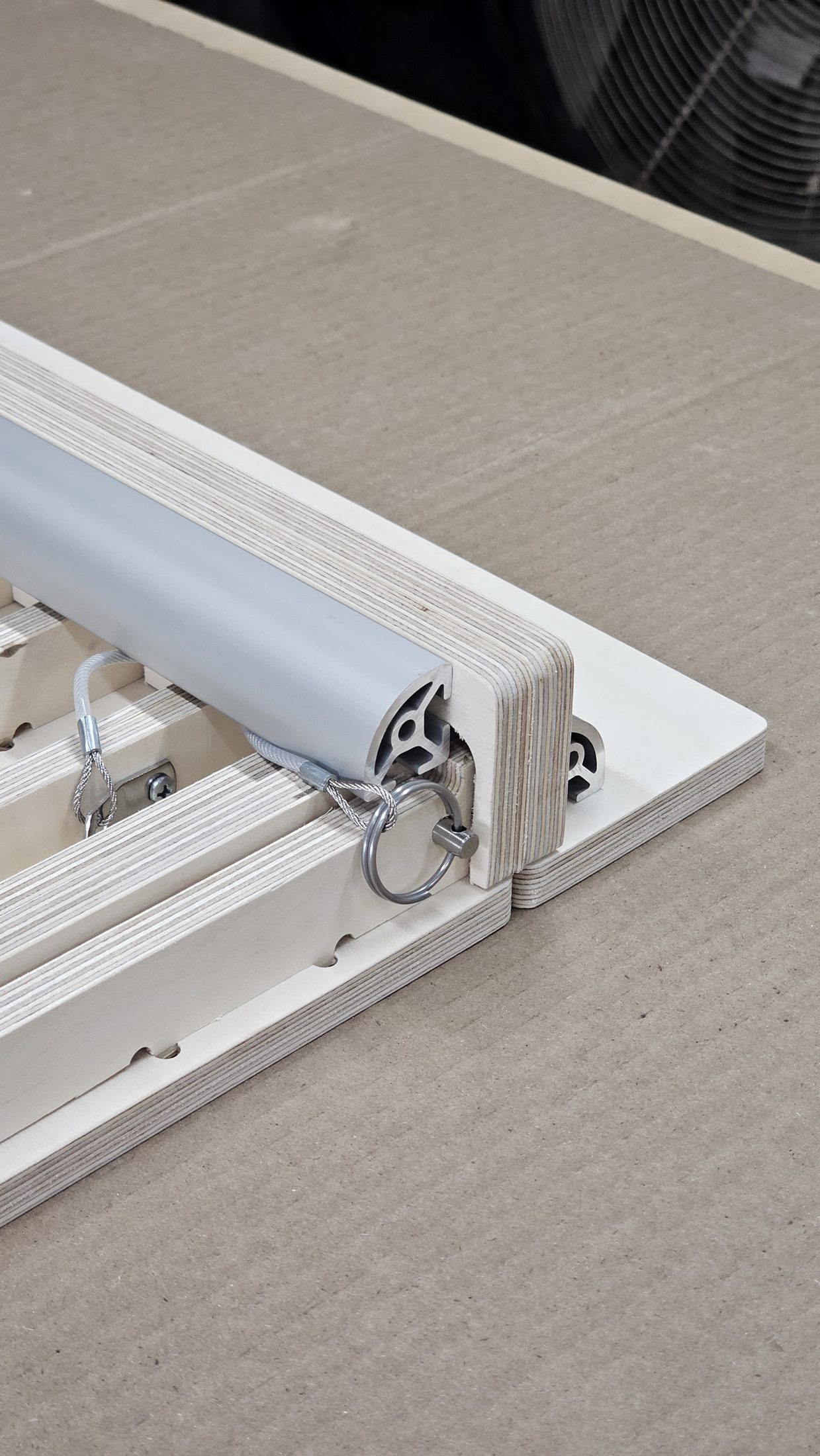 Routed white panel with a cutout and hardware