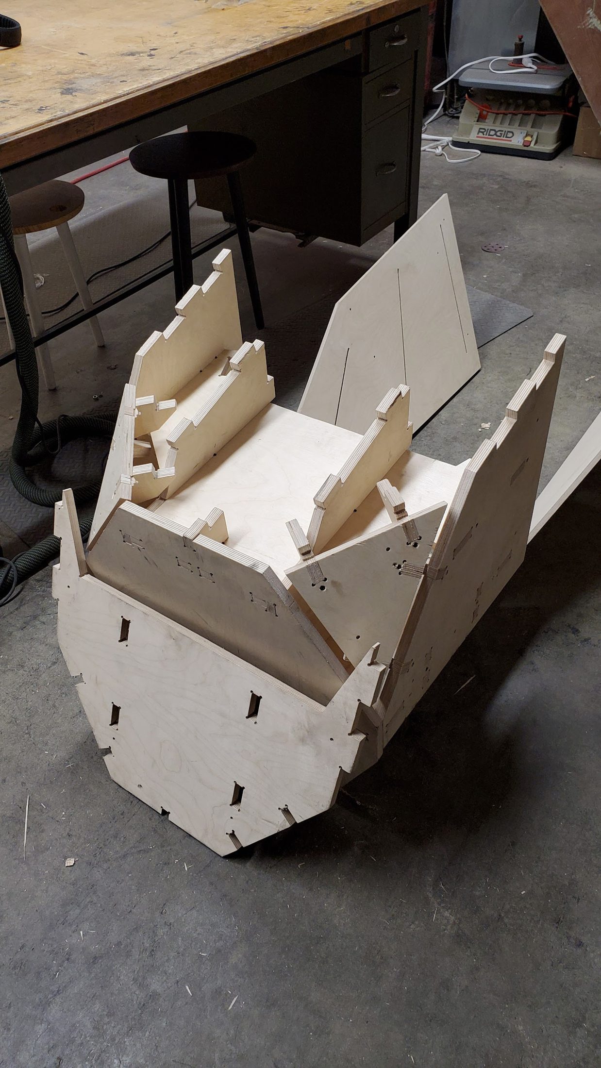 Faceted plywood form assembled from routed parts