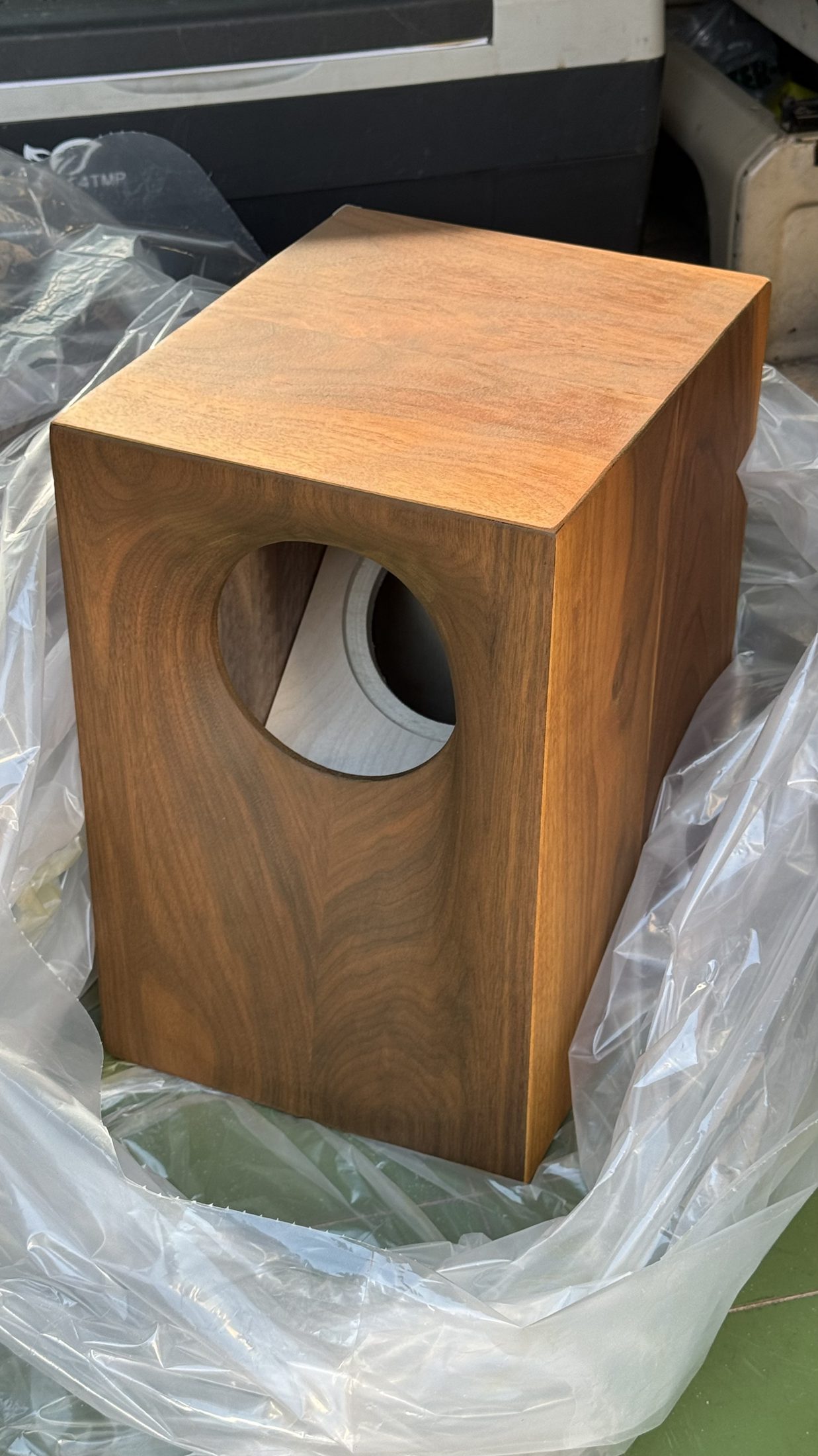 Walnut speaker cabinet with a round port