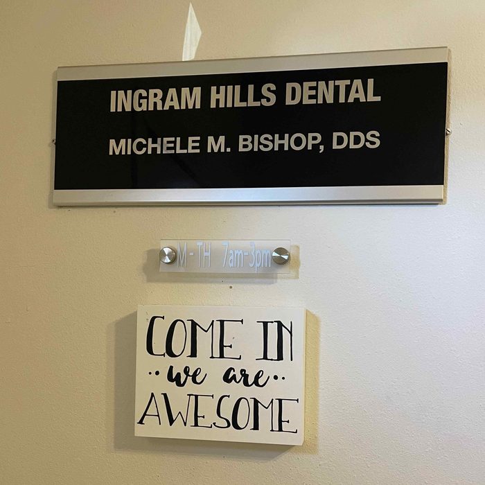 Ingram Hills Dental office entrance sign for Dr. Michele Bishop, DDS, in San Antonio, TX